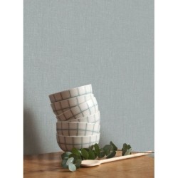 Papel pintado azul horizonte, con textura de lino jaspeado, modelo Caractere de Casadeco