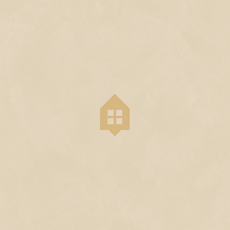 Papel pintado arena con efecto de cal natural y textura mate, colección Chalk de Caselio.