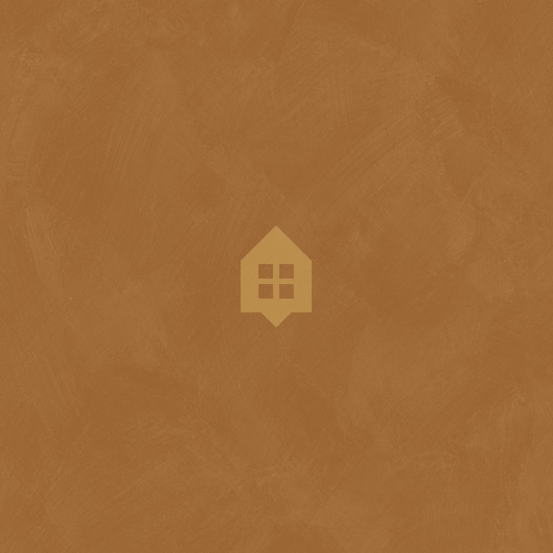 Papel pintado terracota con efecto de cal natural y textura mate, colección Chalk de Caselio.