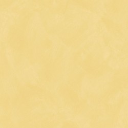 Papel pintado amarillo dorado con efecto de cal natural y textura mate, colección Chalk de Caselio.