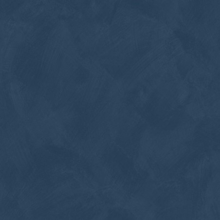Papel pintado azul universo con efecto de cal natural y textura mate, colección Chalk de Caselio.