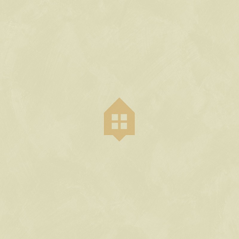 Papel pintado verde almendra con efecto de cal natural y textura mate, colección Chalk de Caselio.