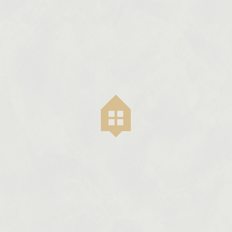 Papel pintado gris perla con efecto de cal natural y textura mate, colección Chalk de Caselio.