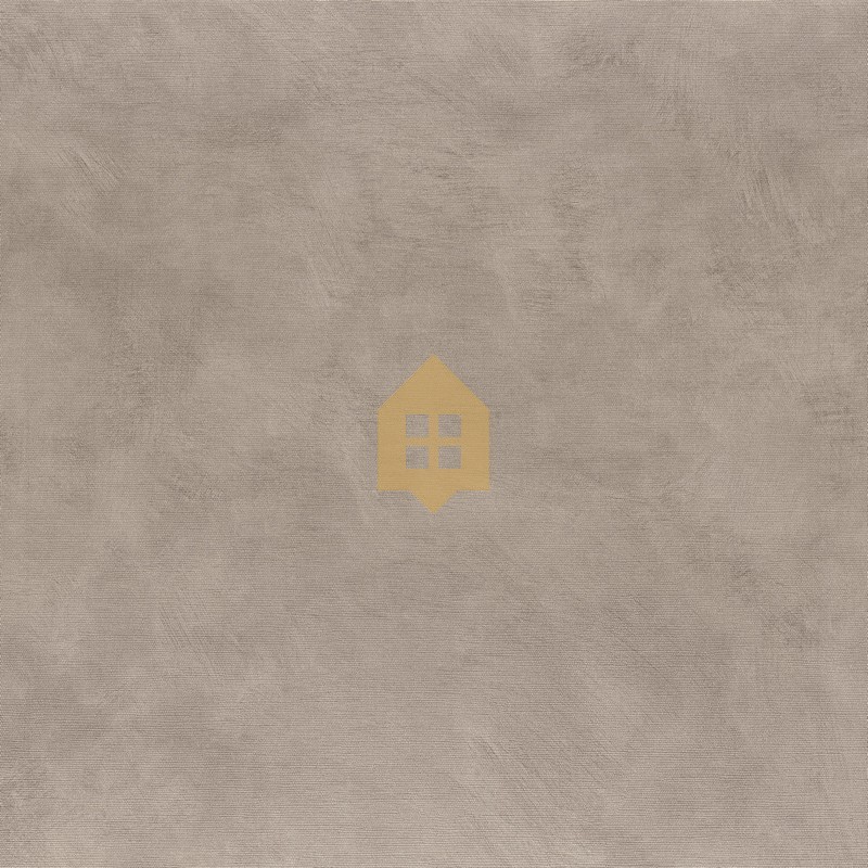 Papel pintado Argile de Casamance con acabado mate, textura de cal y grano de lienzo en relieve sutil.